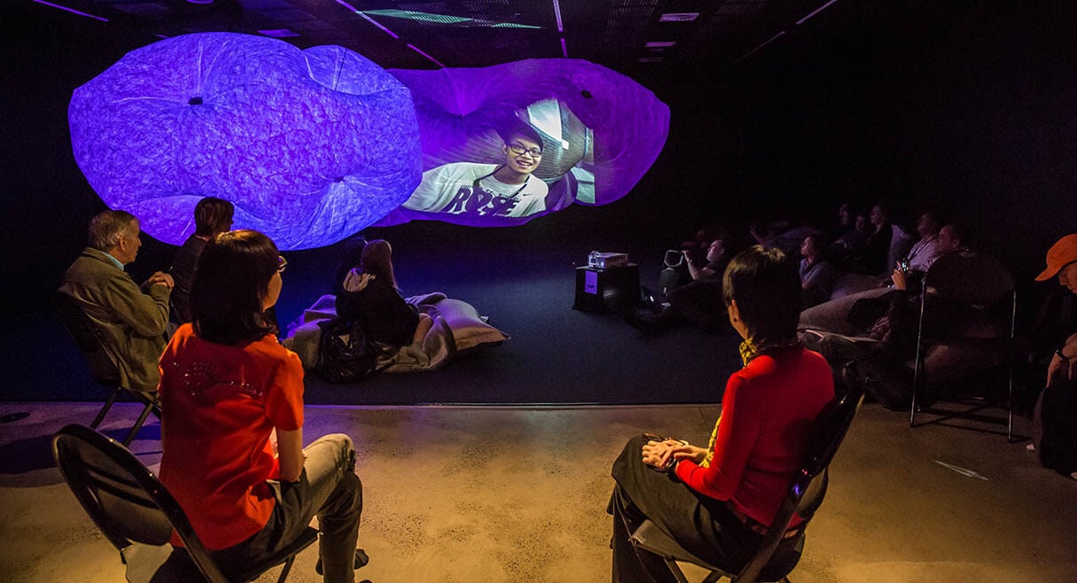 snoosphere with people sitting in the space